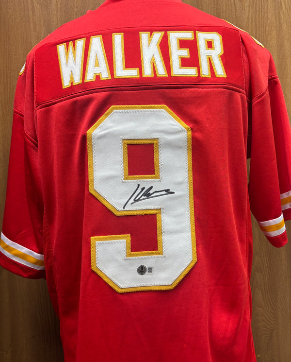 Kansas City Chiefs Kenneth Walker III Jersey Helmets and Footballs